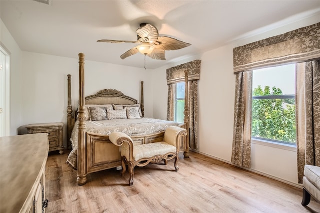 8201 Georgie Trace Ave, Austin, TX 78747 - bedroom featuring light wood-style floors and a ceiling fan
