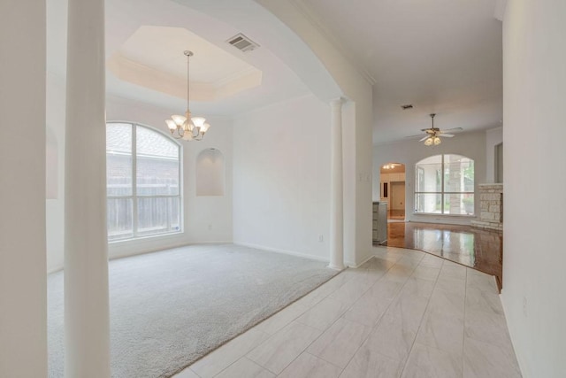 3624 Malone Dr, Austin, TX 78749 - empty room featuring arched walkways, plenty of natural light, light colored carpet, and ceiling fan
