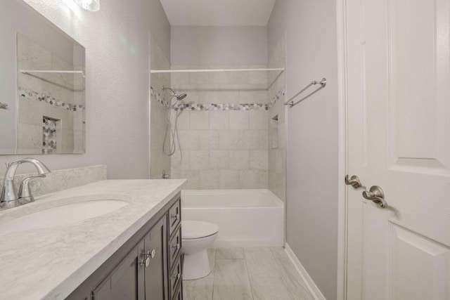 3624 Malone Dr, Austin, TX 78749 - bathroom featuring vanity, bathing tub / shower combination, and marble look tiles