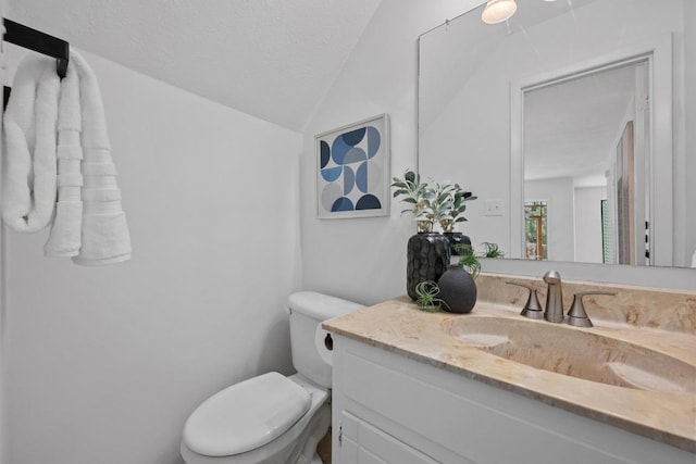 1511 Terrapin Ct Unit B, Austin, TX 78746 - half bath with vanity, vaulted ceiling, and a textured ceiling