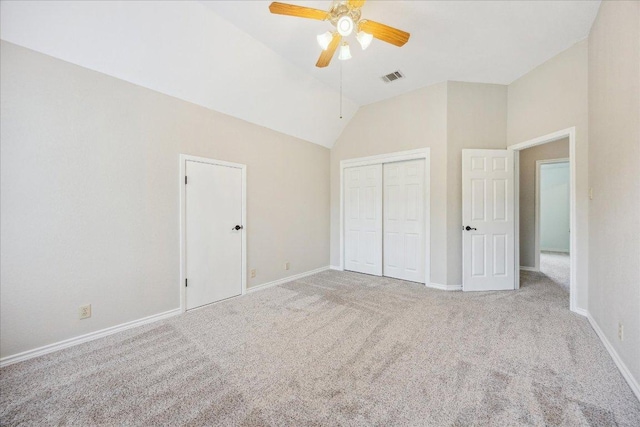9007 Tweed Berwick Dr, Austin, TX 78750 - unfurnished bedroom with carpet flooring, vaulted ceiling, baseboards, and a closet