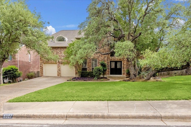 9007 Tweed Berwick Dr, Austin, TX 78750 - view of front of house featuring brick siding, a garage, and driveway