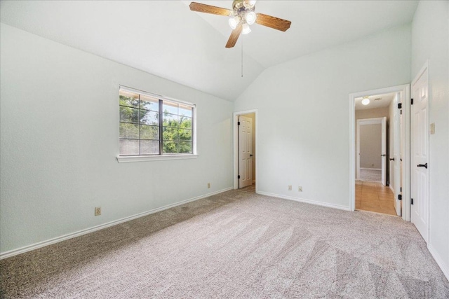9007 Tweed Berwick Dr, Austin, TX 78750 - unfurnished bedroom with vaulted ceiling, baseboards, ceiling fan, and carpet flooring
