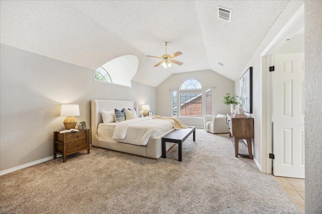 9007 Tweed Berwick Dr, Austin, TX 78750 - bedroom with visible vents, a textured ceiling, lofted ceiling, and light carpet
