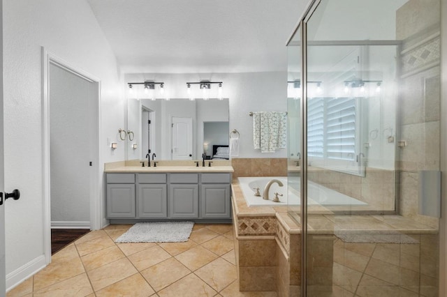 108 Perpetuation Dr Unit 802, Lakeway, TX 78734 - full bath with a bath, double vanity, a shower stall, and tile patterned floors