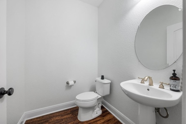 108 Perpetuation Dr Unit 802, Lakeway, TX 78734 - bathroom with wood finished floors, toilet, and baseboards