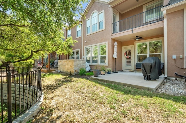 108 Perpetuation Dr Unit 802, Lakeway, TX 78734 - rear view of property with stucco siding, a ceiling fan, a patio, and a balcony