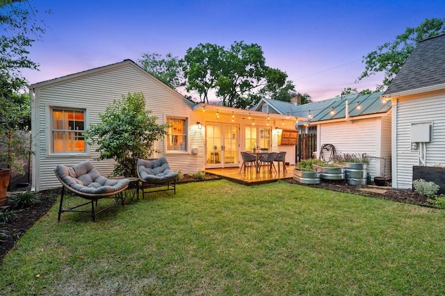 1107 Maufrais St, Austin, TX 78703 - rear view of house with a deck, a yard, an outdoor hangout area, and french doors