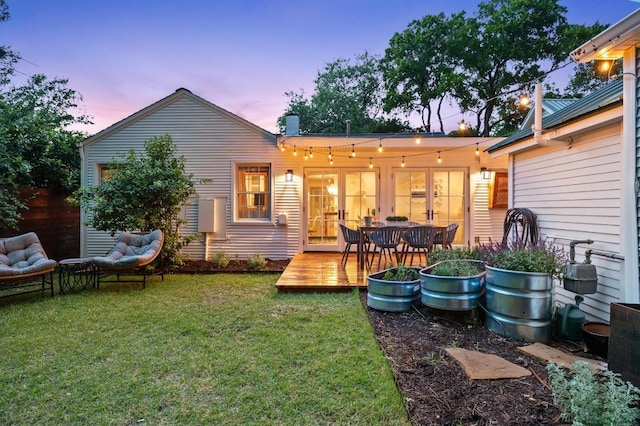 1107 Maufrais St, Austin, TX 78703 - rear view of property with a wooden deck, a lawn, and an outdoor hangout area