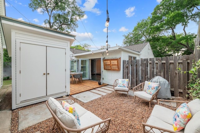 1107 Maufrais St, Austin, TX 78703 - view of patio featuring a wooden deck and a shed