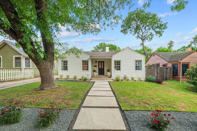 1107 Maufrais St, Austin, TX 78703 - view of front facade with a chimney