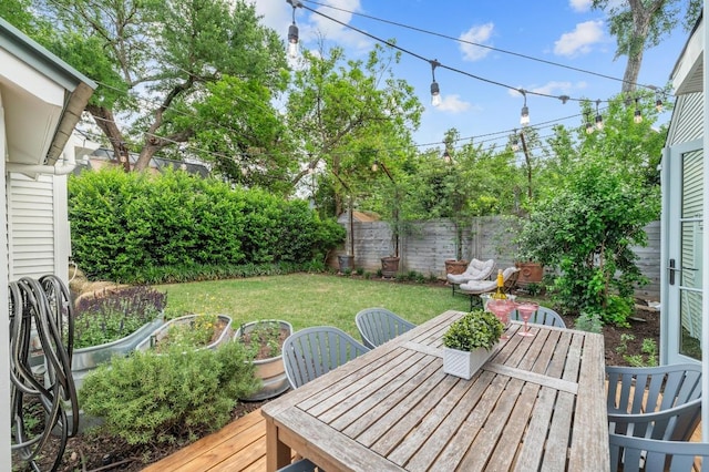 1107 Maufrais St, Austin, TX 78703 - wooden deck with a fenced backyard and outdoor dining space