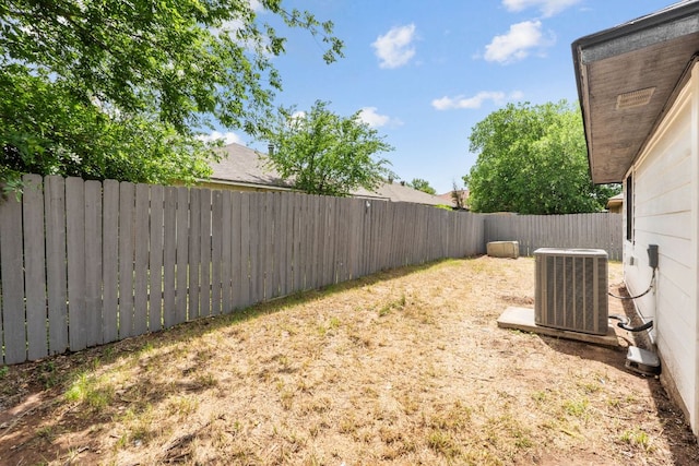 609 Clearwater Trl, Round Rock, TX 78664 - fenced backyard featuring cooling unit