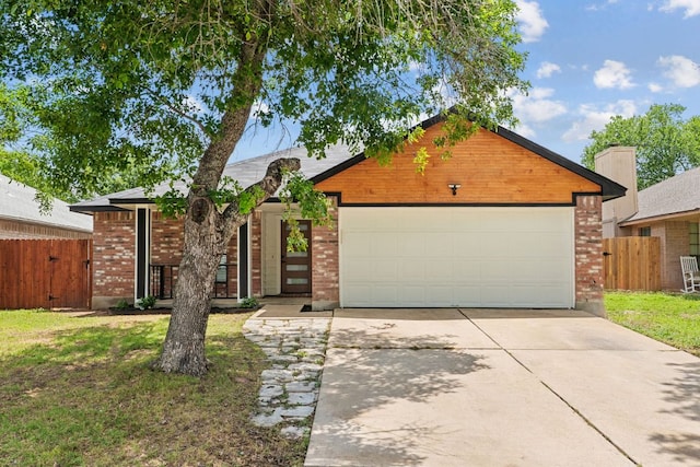 609 Clearwater Trl, Round Rock, TX 78664 - view of front facade with concrete driveway, brick siding, and a garage