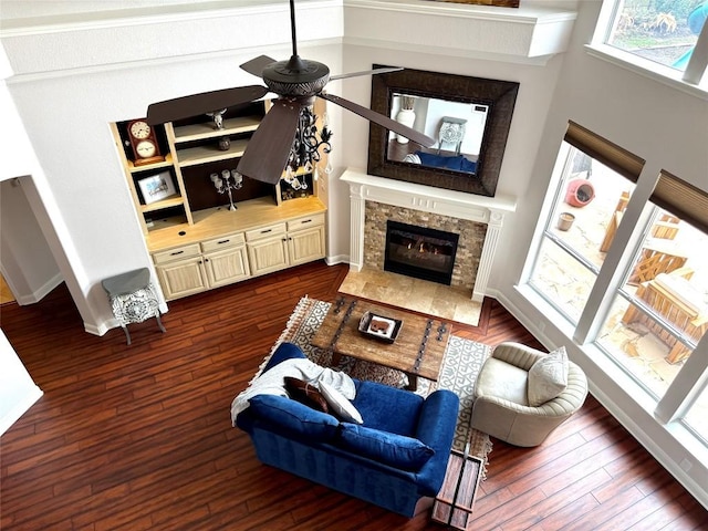 804 Lakewood Hills Ter, Austin, TX 78732 - living room with ceiling fan, a fireplace, and hardwood / wood-style floors