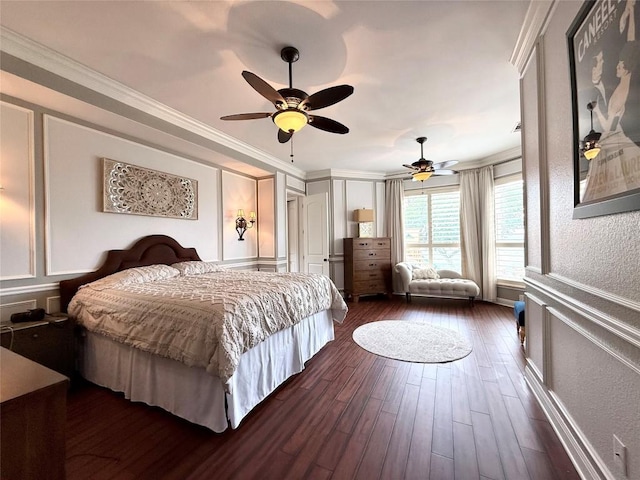 804 Lakewood Hills Ter, Austin, TX 78732 - bedroom featuring dark wood finished floors, a decorative wall, crown molding, and ceiling fan