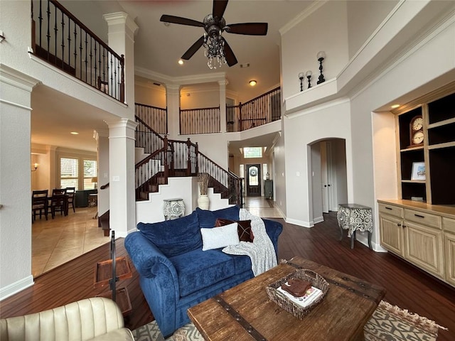 804 Lakewood Hills Ter, Austin, TX 78732 - living area featuring ceiling fan, ornate columns, stairway, a towering ceiling, and recessed lighting