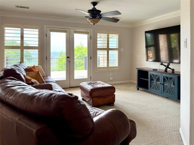 804 Lakewood Hills Ter, Austin, TX 78732 - living area with french doors, carpet floors, crown molding, a ceiling fan, and baseboards