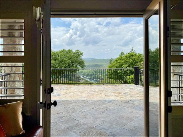 804 Lakewood Hills Ter, Austin, TX 78732 - entryway with stone finish floors and healthy amount of natural light