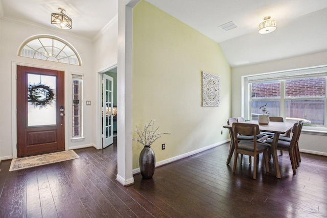 dining room with visible vents, crown molding, dark wood-style floors, and baseboards