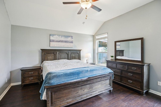 bedroom with a ceiling fan, baseboards, lofted ceiling, and dark wood-type flooring