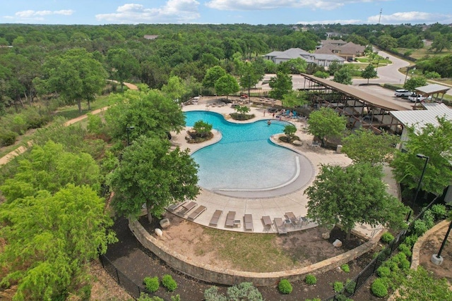 aerial view featuring a view of trees
