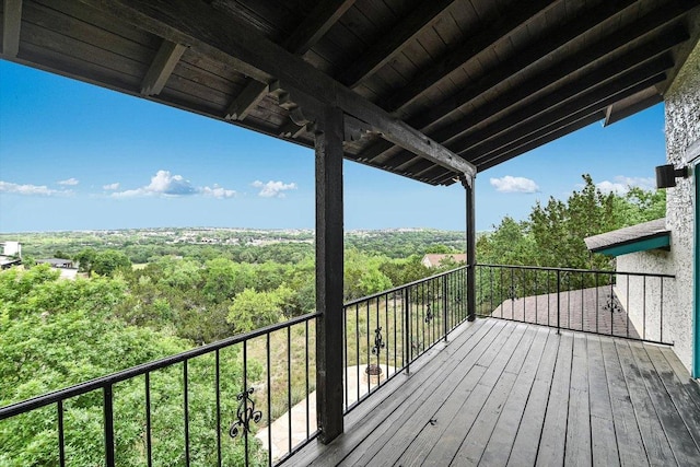 deck featuring a wooded view