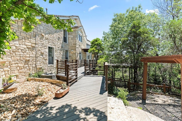 1313 Spyglass Dr, Austin, TX 78746 - wooden terrace with central air condition unit