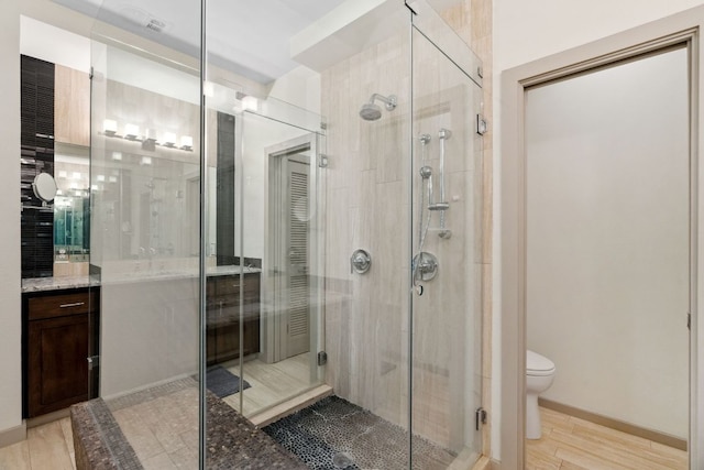 9 Swiftwater Trl, The Hills, TX 78738 - bathroom with a shower stall and vanity