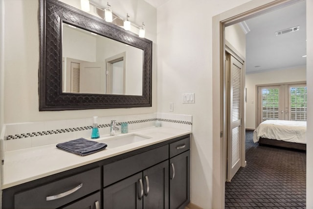 9 Swiftwater Trl, The Hills, TX 78738 - bathroom featuring vanity and ensuite bathroom