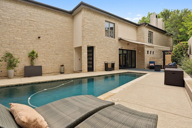 9 Swiftwater Trl, The Hills, TX 78738 - swimming pool featuring a patio area