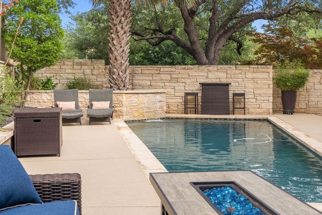 9 Swiftwater Trl, The Hills, TX 78738 - view of swimming pool with a patio