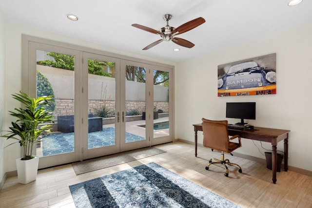 9 Swiftwater Trl, The Hills, TX 78738 - office area featuring plenty of natural light, wood finished floors, ceiling fan, french doors, and recessed lighting