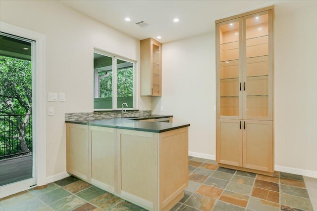 5412 Moon Shadow Dr, Austin, TX 78735 - kitchen featuring light brown cabinetry, visible vents, and stone tile flooring