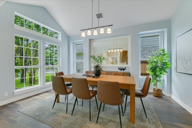 5412 Moon Shadow Dr, Austin, TX 78735 - dining area featuring visible vents, dark wood-style flooring, lofted ceiling, and baseboards