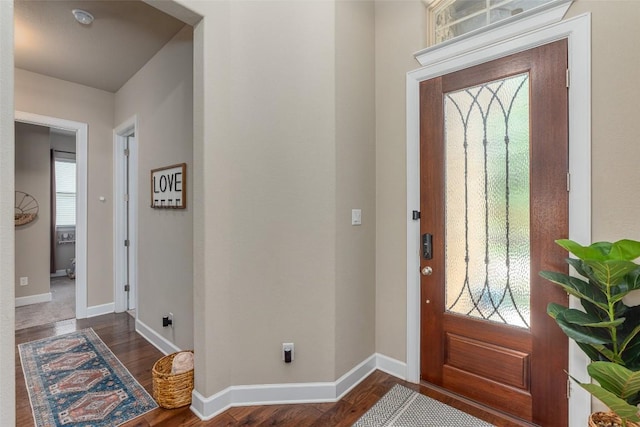 2421 Carretera Dr, Leander, TX 78641 - entryway with baseboards and dark wood-style floors
