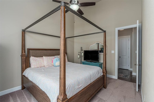 2421 Carretera Dr, Leander, TX 78641 - carpeted bedroom with baseboards, ceiling fan, and a towering ceiling