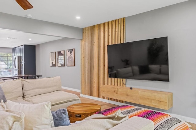 1712 Alleghany Dr, Austin, TX 78741 - living room with wood finished floors, baseboards, and recessed lighting