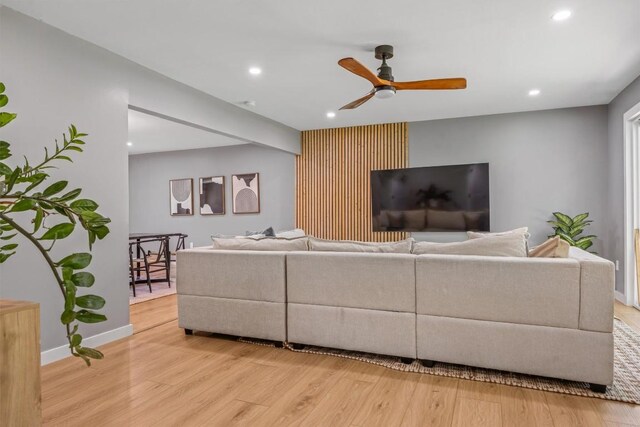 1712 Alleghany Dr, Austin, TX 78741 - living area with light wood finished floors, recessed lighting, a ceiling fan, and baseboards