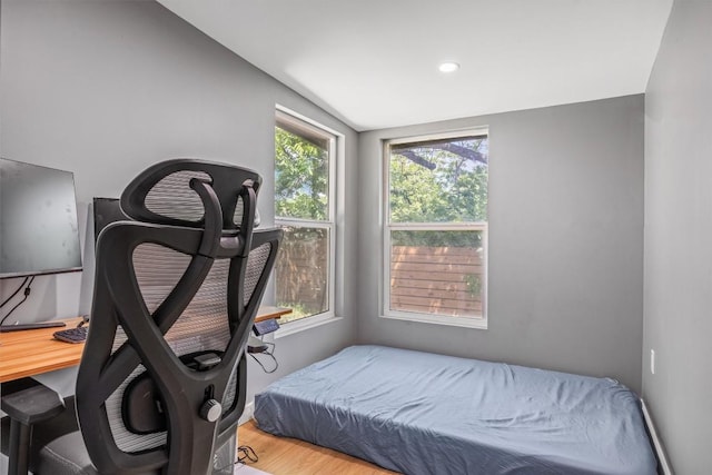 1712 Alleghany Dr, Austin, TX 78741 - bedroom with vaulted ceiling and wood finished floors