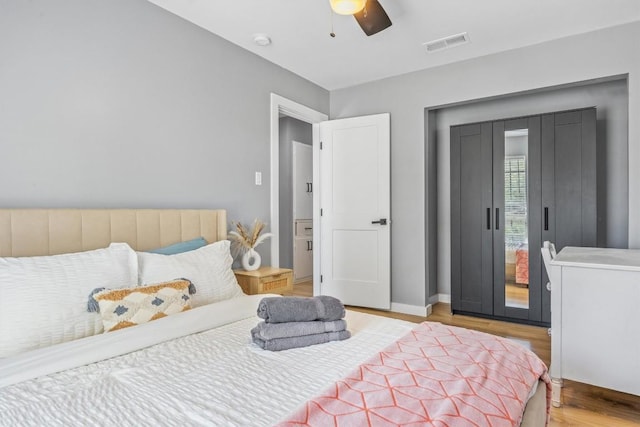 1712 Alleghany Dr, Austin, TX 78741 - bedroom featuring light wood-style flooring, access to outside, a ceiling fan, and baseboards