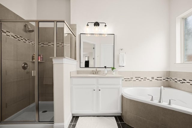 18617 Rio Chama Ln, Austin, TX 78738 - full bath with vanity, a garden tub, a stall shower, and plenty of natural light