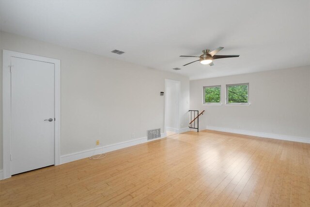 6405 Danwood Dr, Austin, TX 78759 - unfurnished room featuring a ceiling fan and light wood-type flooring