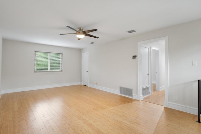 6405 Danwood Dr, Austin, TX 78759 - unfurnished room with ceiling fan and light wood finished floors