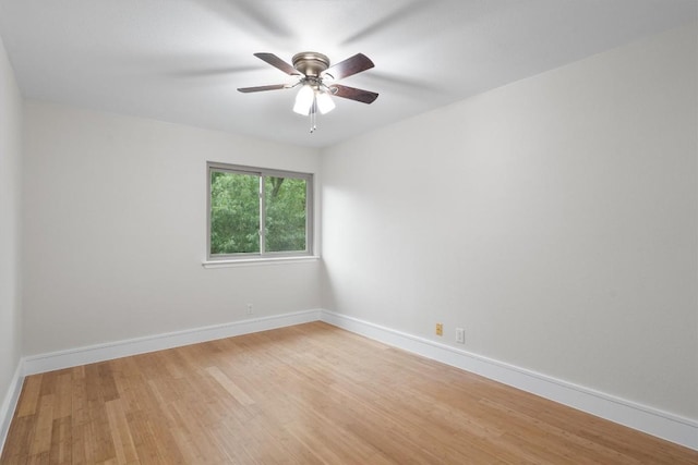6405 Danwood Dr, Austin, TX 78759 - spare room featuring wood finished floors and a ceiling fan