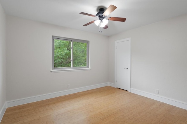 6405 Danwood Dr, Austin, TX 78759 - spare room with wood finished floors and a ceiling fan