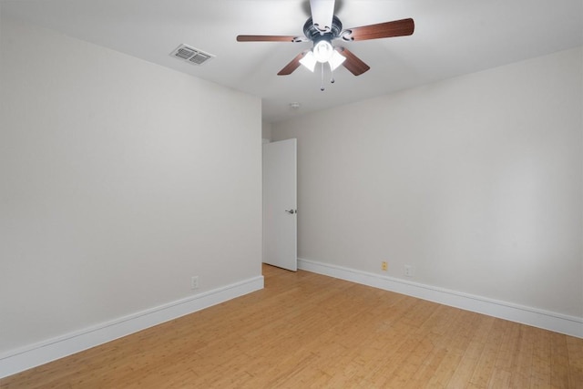 6405 Danwood Dr, Austin, TX 78759 - empty room featuring light wood finished floors and a ceiling fan