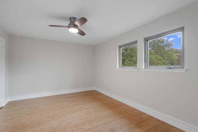6405 Danwood Dr, Austin, TX 78759 - spare room with light wood finished floors and a ceiling fan