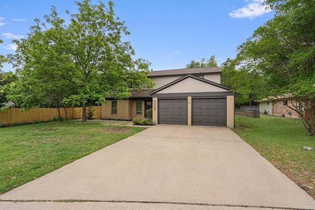 6405 Danwood Dr, Austin, TX 78759 - traditional-style house featuring a garage, driveway, and brick siding