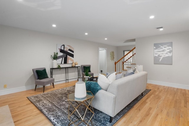 6405 Danwood Dr, Austin, TX 78759 - living area with stairway, wood finished floors, and recessed lighting